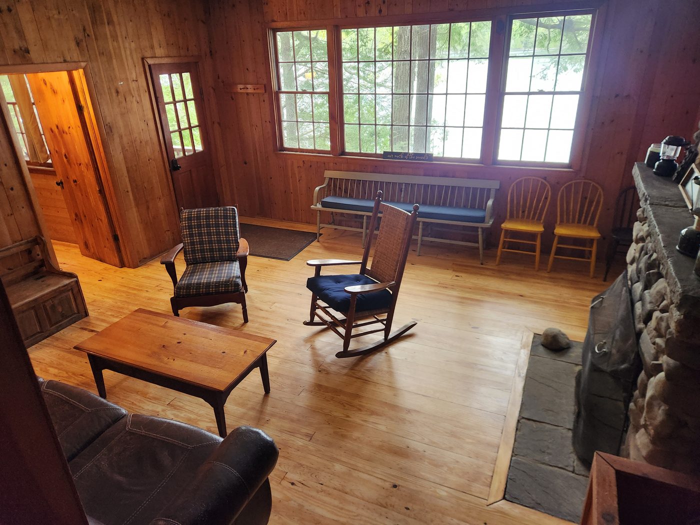 Screened cabin porch at Craig Pond Wilderness Lodge