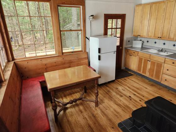 Kitchen table and windows in a cabin