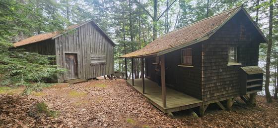 Camp workshop and outbuilding among the trees