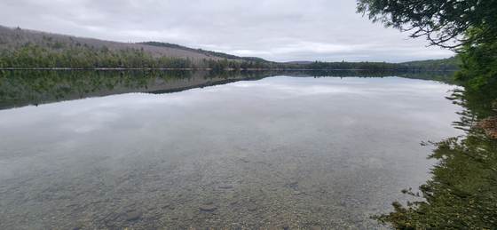 Craig Pond mirror-flat on a still morning