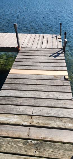 Weathered planks on the dock at Craig Pond