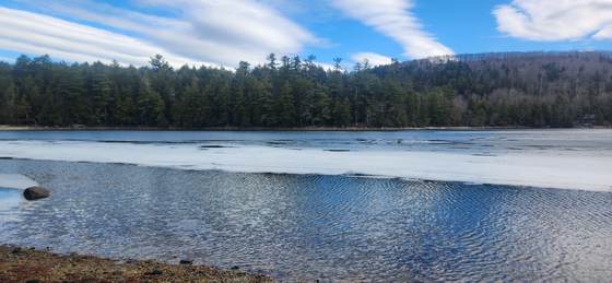 Ice going out on Craig Pond in early spring