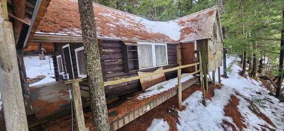 Snow on the roof of the group area kitchen above the pond